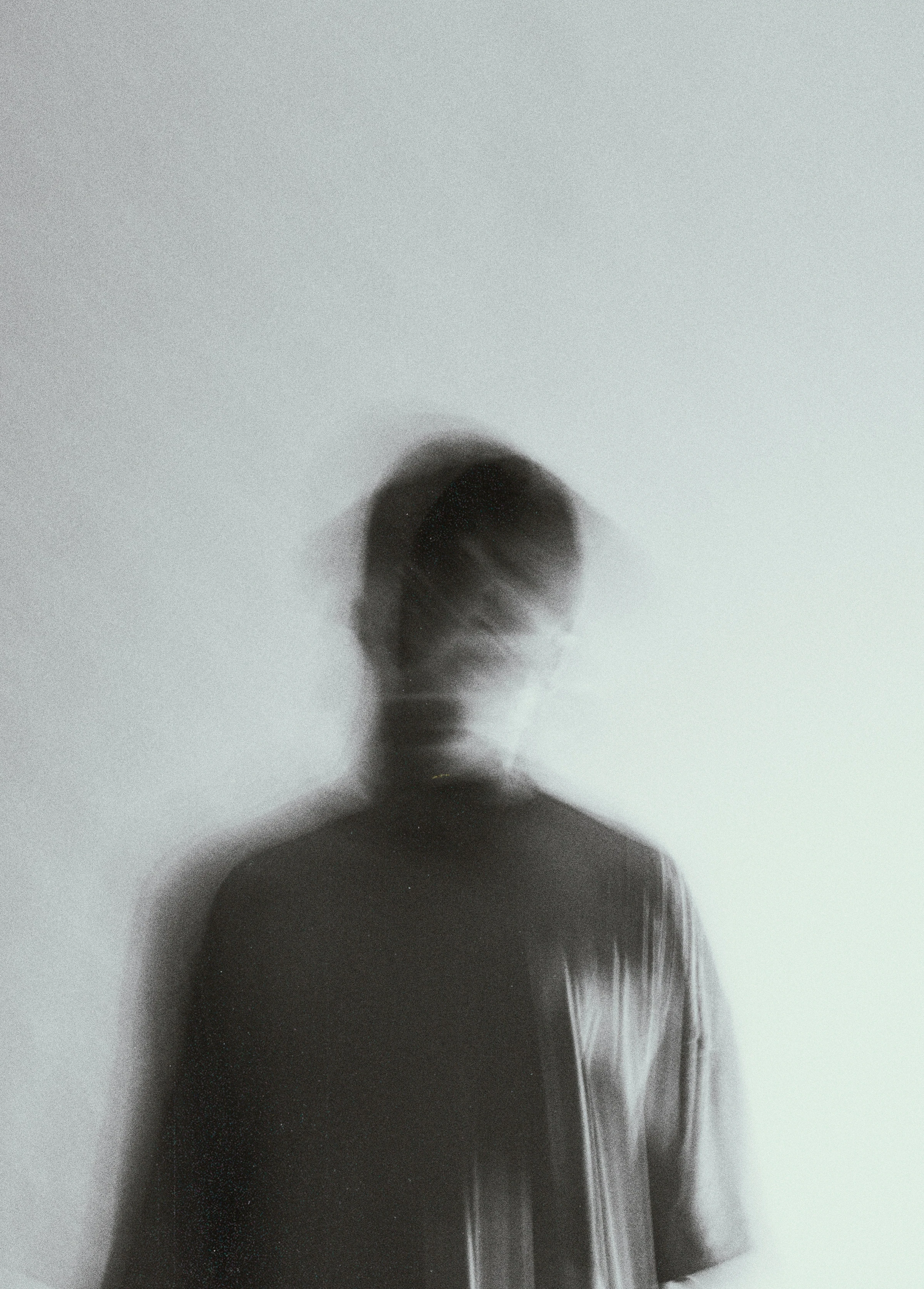 Soft-focus portrait of Stephanie Khalil against a pale wall