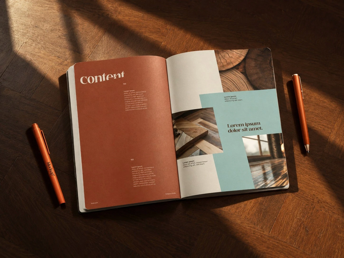 Open BWĀ brand booklet with warm wood tones and furniture imagery