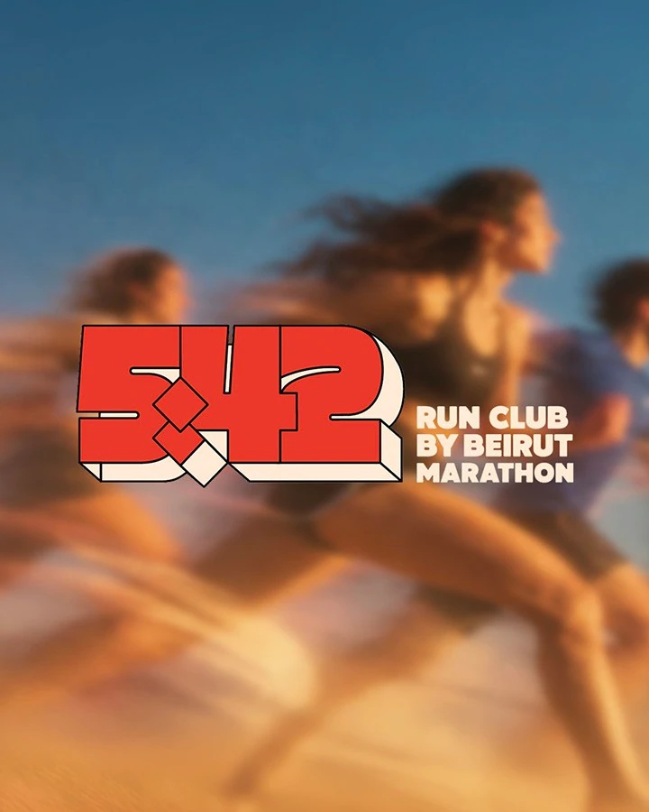 Red 5:42 Run Club logo over a blurred photograph of runners